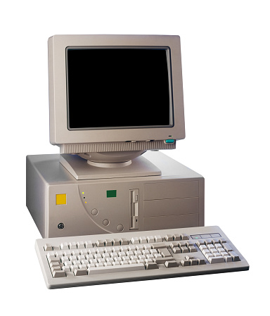 Nineties obsolete tower pc computer isolated on white with clipping path
