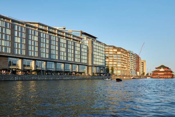 istock Oosterdokskade modern waterfront architecture at summer sunset in Amsterdam 1421907092
