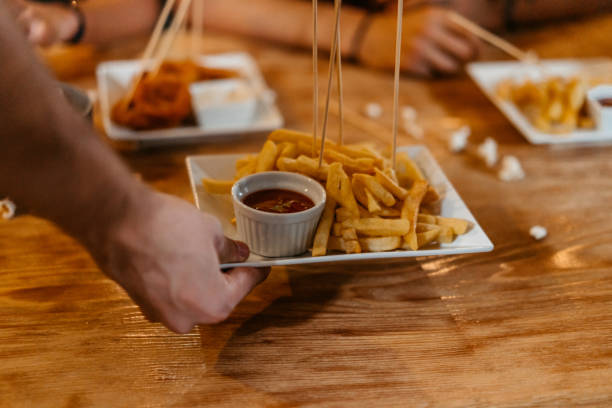istock Serving French Fries In A Pub 1421907856