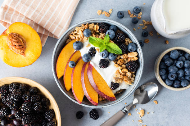 istock Granola and fruit bowl with greek yogurt 1421907958