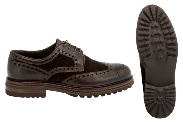 istock Brown Leather Men's Shoes On White Background 1421910944