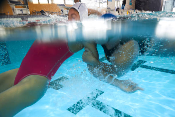 istock A female water polo player commits a fault. 1421911708
