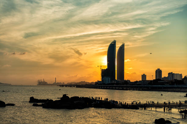 seaside city skyline at sunset