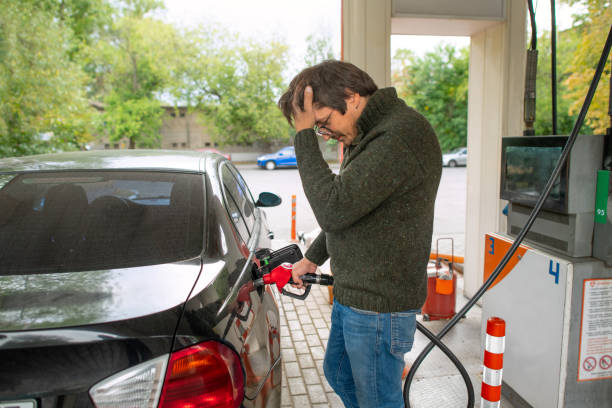 istock Upset man at a gas s 1421916224