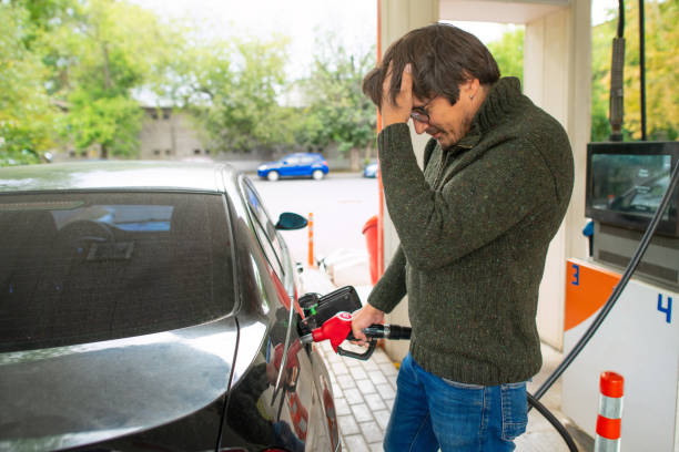 istock Upset man at a gas s 1421916410