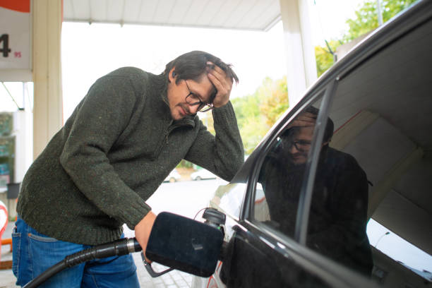 istock Upset man at a gas s 1421916454