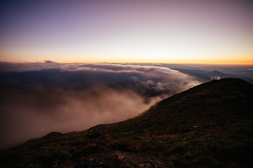 Landscape views of sunset from the summit of Mt Buller over the Victorian Alps in the Victorian High Country, Australia