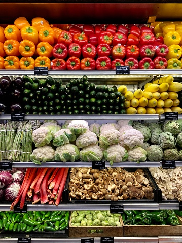 A visually-pleasing array of fresh fruit and vegetables in an organic store