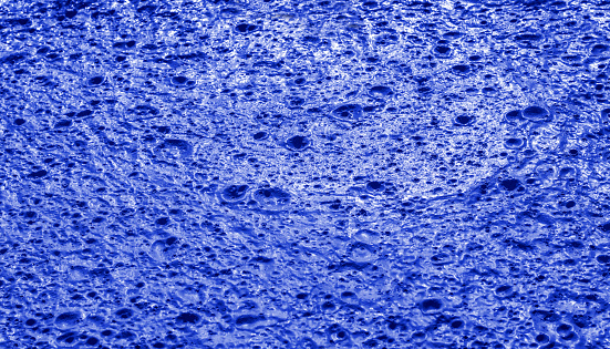 Blue background, Monochrome blue texture. Selective focus.