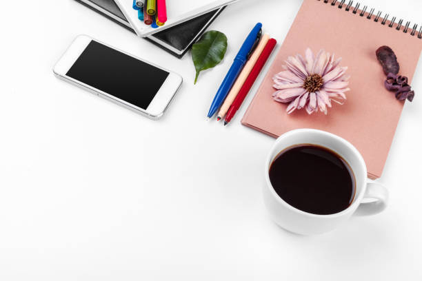 istock White office desk table, business and education concept 1421926154