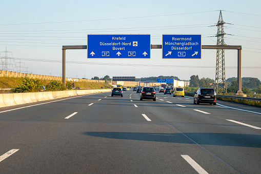 Blue motorway signs with directions to Dortmund, Hannover, Dortmund-Hafen, Frankfurt and Hagen in Germany