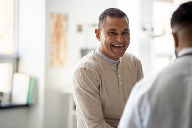 istock Male Patient at a Medical Appointment 1421926867
