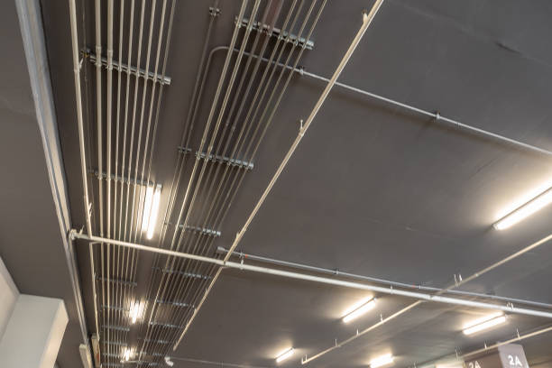 istock Installation of Electrical metallic conduits on the ceiling 1421927642