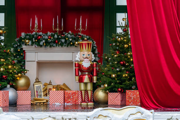 Theatre stage with new year decorations. Fireplace, Nutcracker. giftboxes. Celebration christmas performance