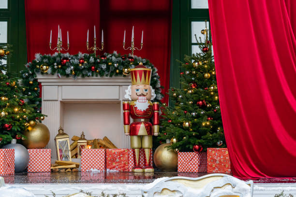 Theatre stage with new year decorations. Fireplace, Nutcracker. giftboxes. Celebration christmas performance Theatre stage with new year decorations. Fireplace, Nutcracker. giftboxes. Celebration christmas performance nutcracker photos stock pictures, royalty-free photos & images