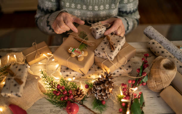 istock A tabletop covered in Christmas wrapped gifts 1421931315
