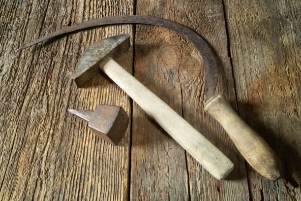 istock Old tools on a wooden table close-up 1421934324
