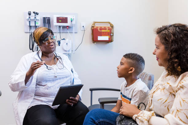 istock Doctor meets with family 1421938973