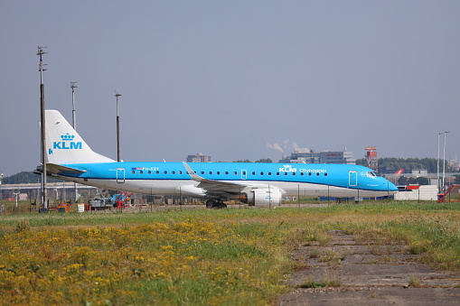 PH-EZB KLM Cityhopper Embraer ERJ-190STD  departing from Amsterdam Schiphol Airport at Aalsmeerbaan the Netherlands