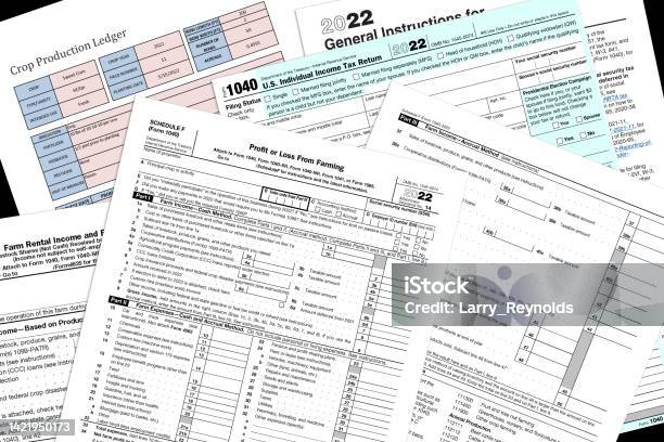 2022 Irs Farming Tax Forms On A Desk Top Stock Photo - Download Image Now - Tax Form, Tax, 2022