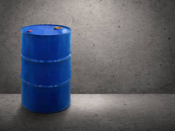 istock Blue oil tank on cement wall background 1421953901