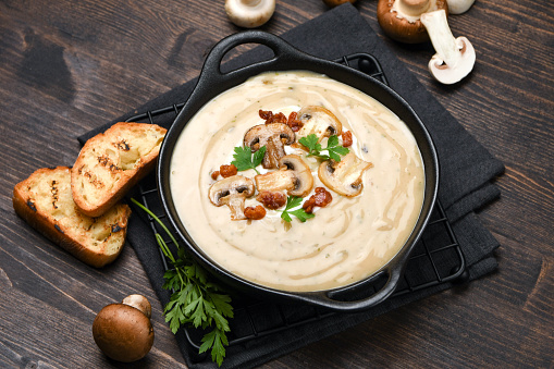 Mushroom soup with bread seasonal cream soup with vegetables