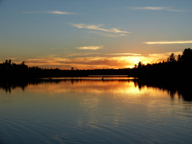 istock Sunset kayak in lake in the fall 1421956062