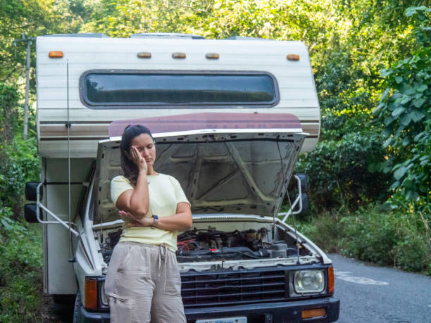 Campervan breakdown, desperate woman stock photo