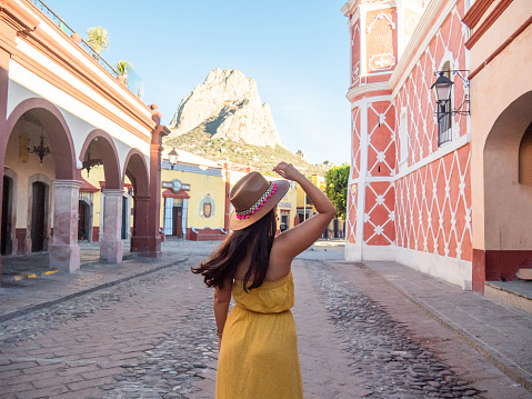 She discovers places and villages in Central America. Argentinian young woman.