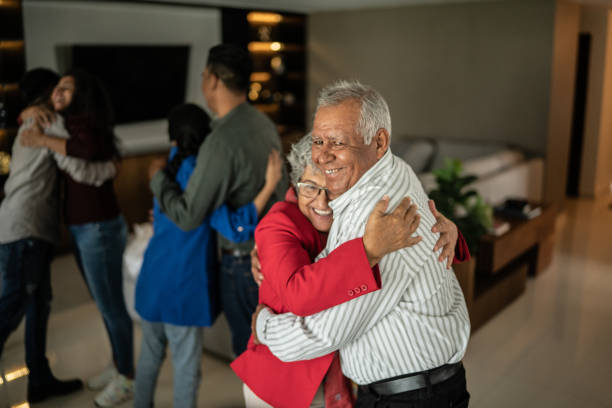istock Family embracing at home 1421959862