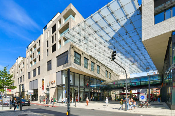 Almere, Netherlands - October 26, 2013: People shopping in the modern city centre of Almere, Flevoland, the youngest and fastest growing city in the Netherlands, where construction began in 1975