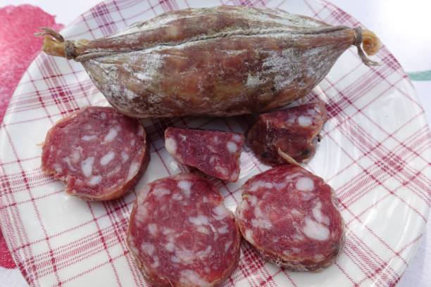 istock Pork sausage  Preparation for a sandwich 1421967853
