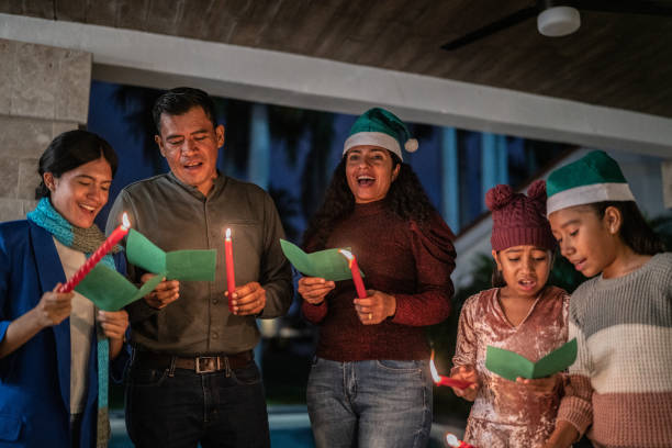istock Family singing christmas carols 1421969545