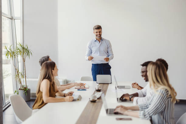 istock Businessman Explaining Business Strategy in a Corporate Office 1421969966