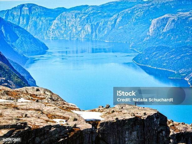Lysefjord Kjerag Is A Popular Mountain Peak That Towers A 1000 Metres Over The Lysefjord Stock Photo - Download Image Now