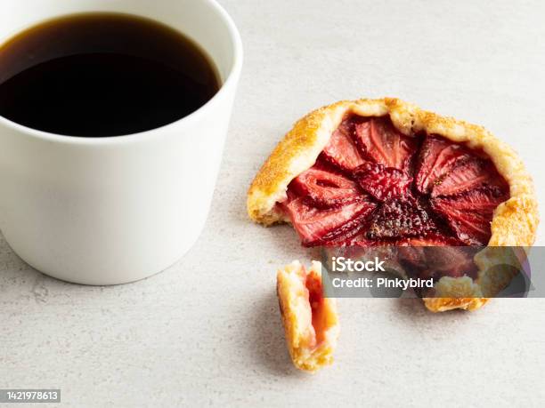 Galette With Coffee Strawberry Galette With Coffee Small Strawberry Tarts Galette Strawberry Tart Strawberry Pie Mini Galette And Coffee Stock Photo - Download Image Now