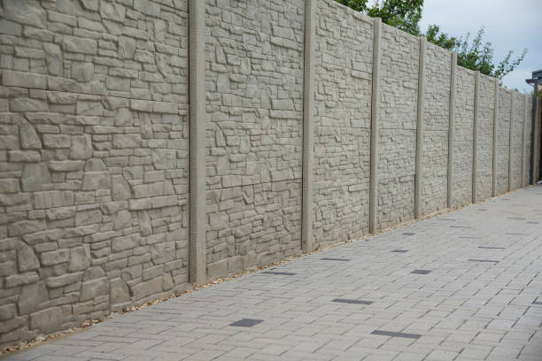 istock Concrete pattern fence and block paving tiles 1421980578