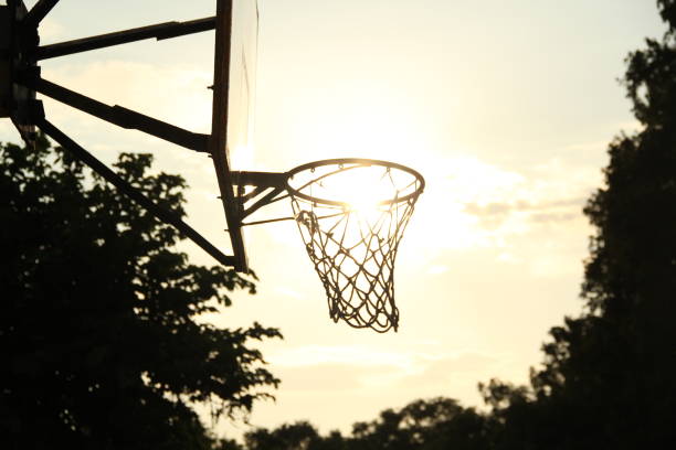 istock Basketball hoop and sunshine goal 1421982604