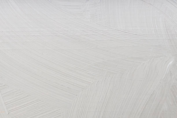 istock gray background with traces of paint and stripes 1421982749