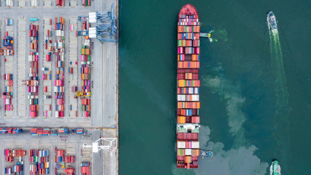 istock Container ship global business company freight shipping import export logistic and transportation by container ship, Container ship cargo freight shipping maritime transport international worldwide. 1421989083