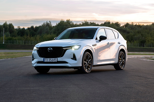 Berlin, Germany - 7th September, 2022: Mazda CX-60 PHEV on a road. This model is the largest Mazda vehicle on European market.