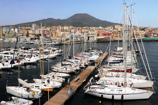 The Port of  Torre del Greco, Naples, Italy, with the townscape of Torre del Greco and Mount Vesuvius in the background