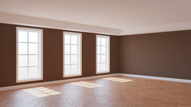 istock Corner of the Sunny Interior with Brown Walls, Three Large Window, White Ceiling 1421999399
