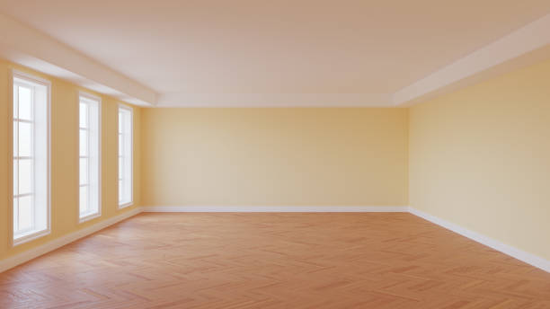 istock Beautiful Room with Light Beige Walls, White Ceiling and Cornice, Three Large Windows 1421999407