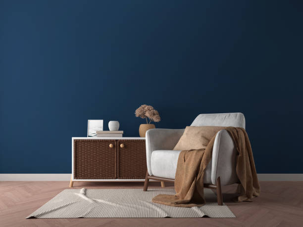 istock Living room interior with armchair table and dark blue wall background.3d rendering 1422006356