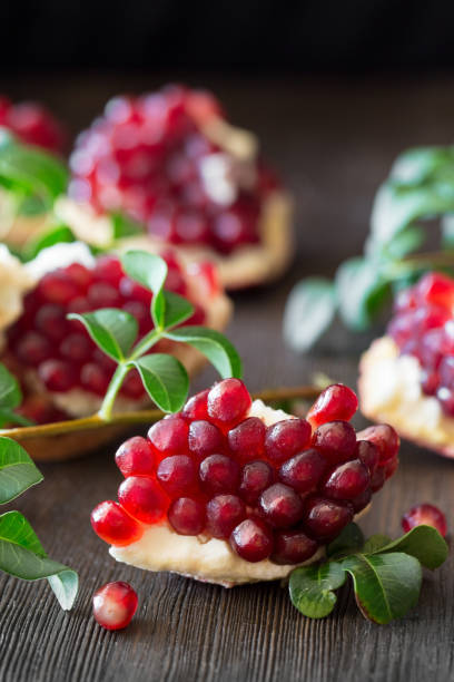 istock Fresh ripe pomegranate on a wooden background, selective focus, copy space 1422010891