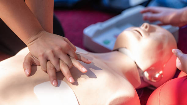 Cardiopulmonary Resuscitation, First Aid Training on a CPR Dummy. stock photo