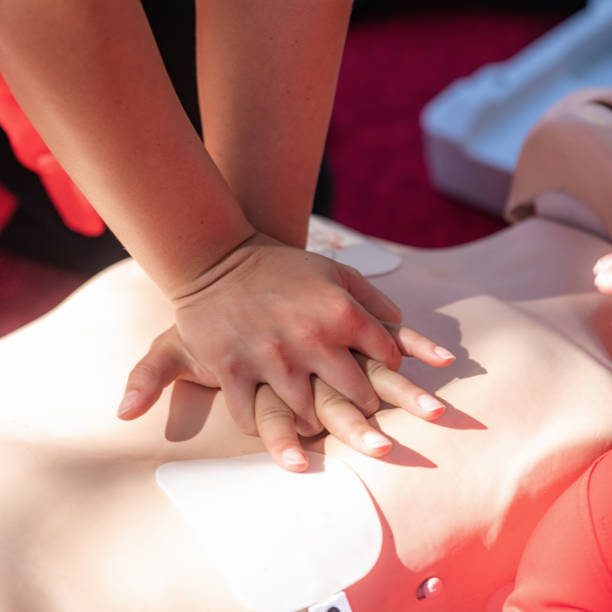 istock Cardiopulmonary Resuscitation, First Aid Training on a CPR Dummy. 1422012636