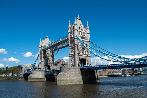 A view of the Tower Bridge in the shade during a sunny and clear day with copy space on top.