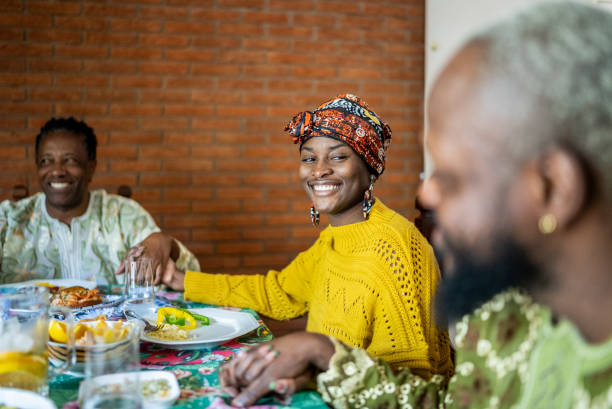istock Family saying grace during lunch at home 1422024238